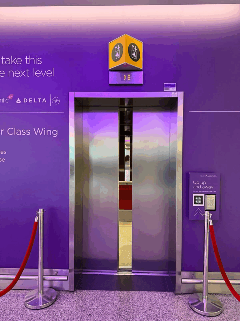 The Virgin Upper Class lift beside the Delta One check-in at LHR