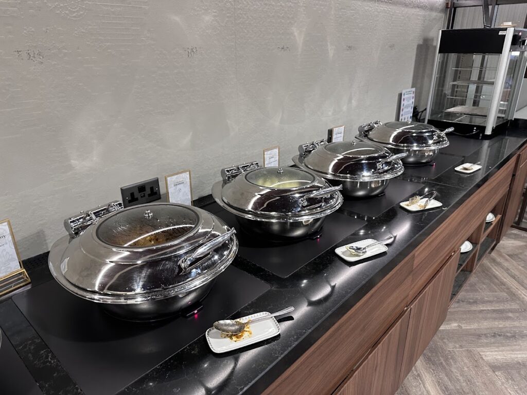 Warm buffet in the SilverKris Lounge Heathrow