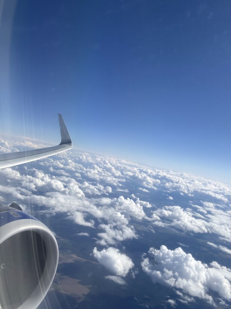 BA A320neo above the clouds