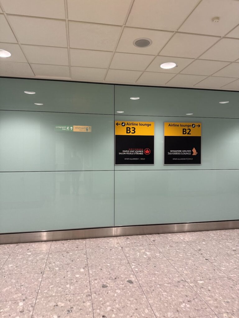 Signs for the Air Canada Maple Leaf Lounge Heathrow