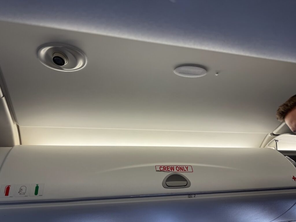 Limited storage in the small E190 overhead bins 