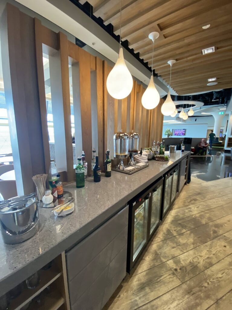 Self-service bar drinks in the Aer Lingus Lounge London Heathrow