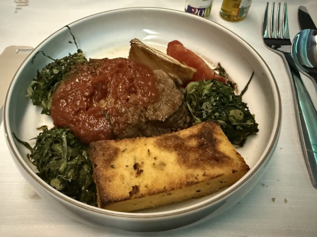 Main course served on LATAM 777 Premium Business