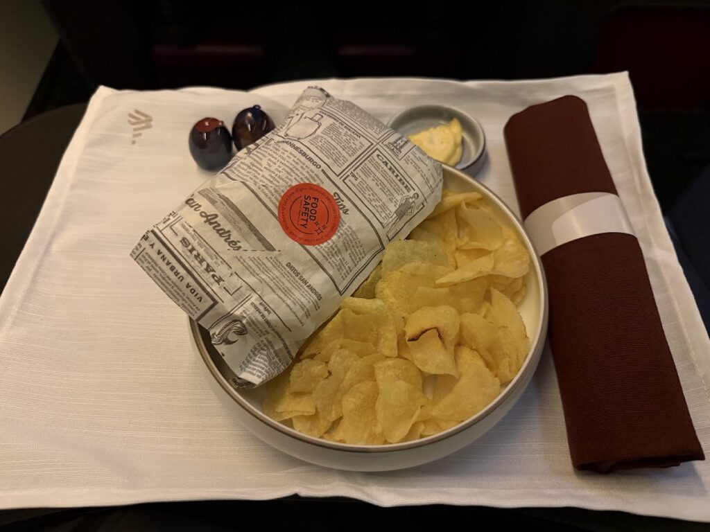 Sandwich & crisps on LATAM 777 Premium Business