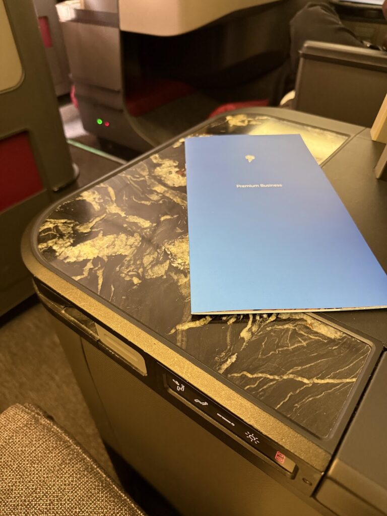 Generous console ledge on the LATAM 777-300 Premium Business seat