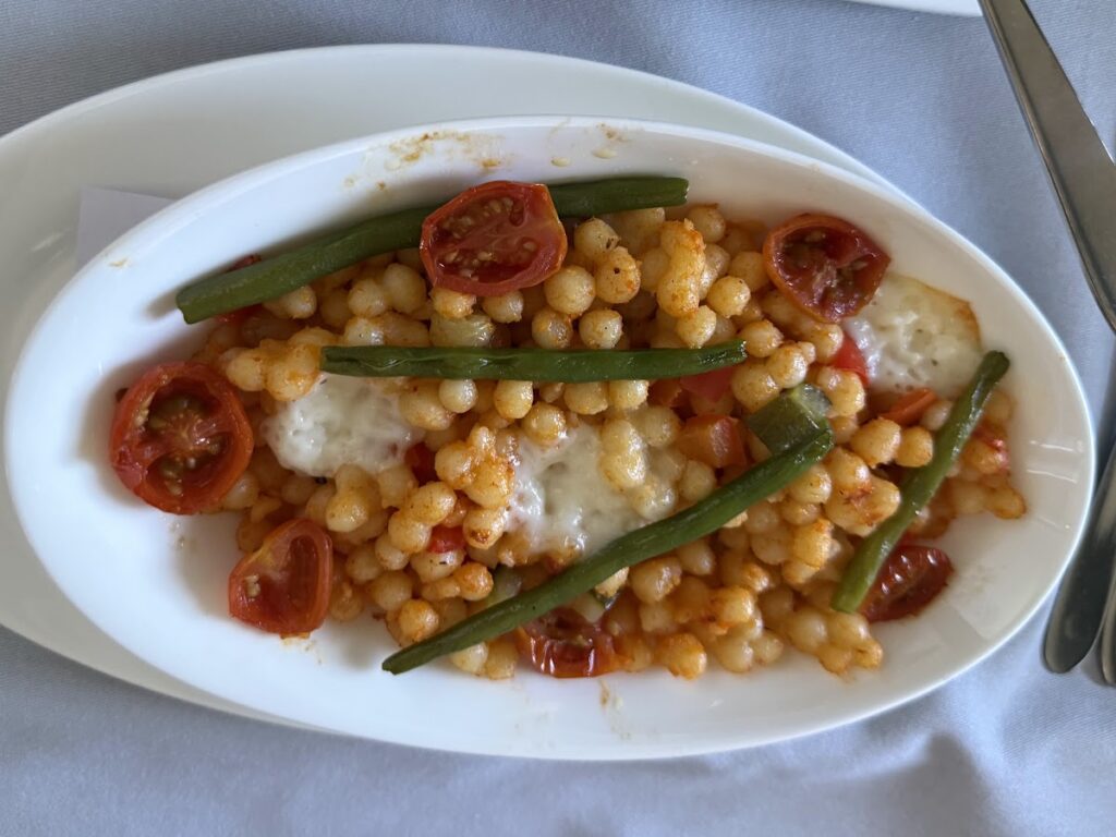 Unappetising couscous veggie main served in BA Club World