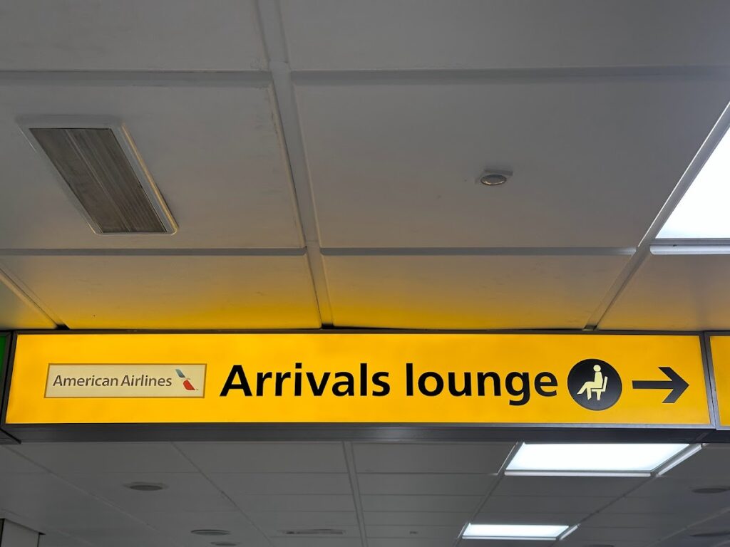 Signage to the American Airlines Arrivals Lounge