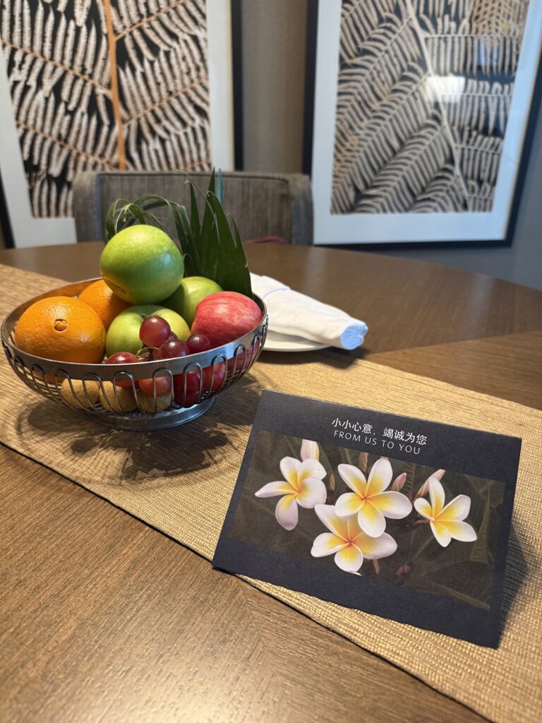Welcome message and fruit bowl at Hilton KK