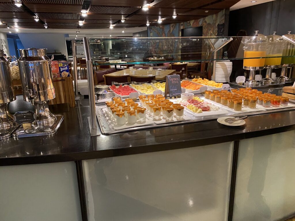 Breakfast buffet with fresh fruit and juices