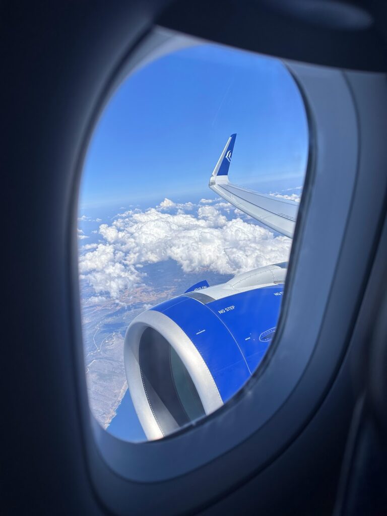 Aegean A321neo engine and wing through cabin window