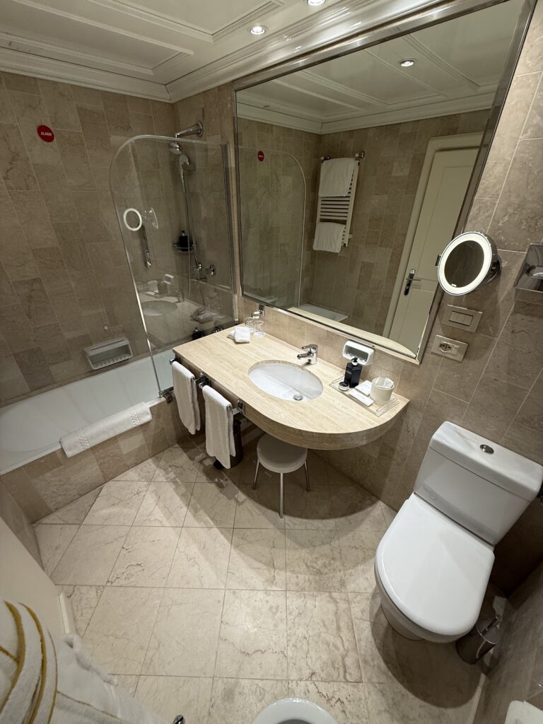 Marble bathroom with bathtub at Parco dei Principi Rome