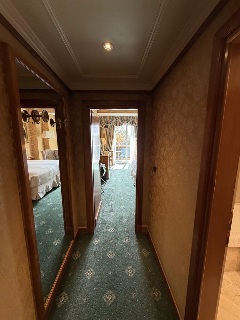 Hallway leading to guest room at Parco dei Principi