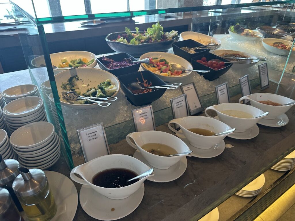Salad bar and dressings at Hilton Pattaya breakfast buffet
