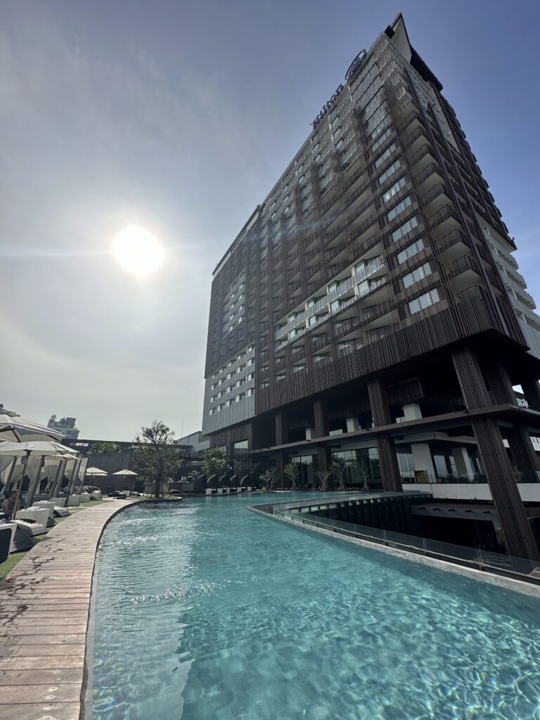 Hilton Pattaya Thailand exterior and poolside at sunset