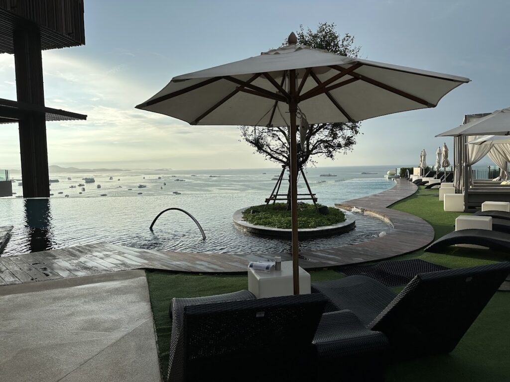 Hilton Pattaya Thailand poolside loungers with sea view