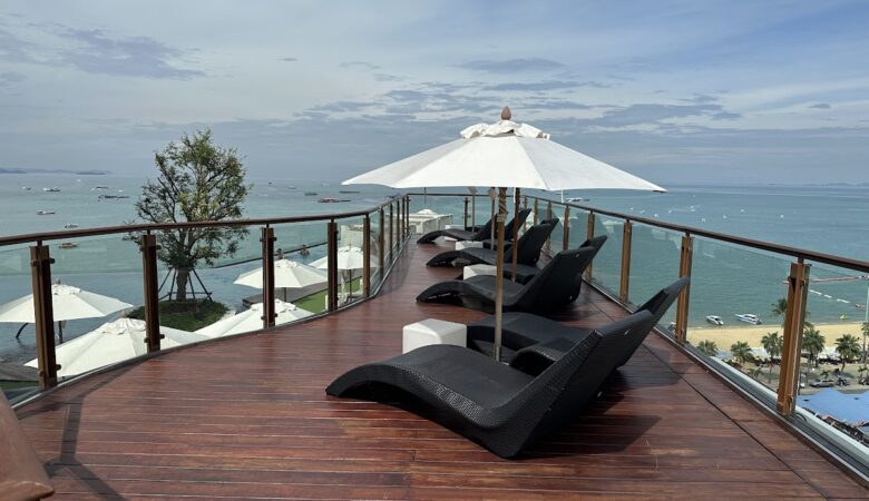 Rooftop sun loungers overlooking Pattaya Bay at Hilton