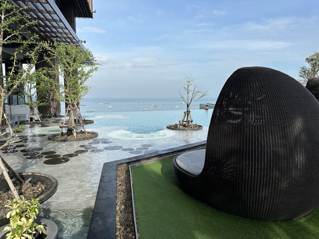 Hilton Pattaya infinity pool with wicker pod seating