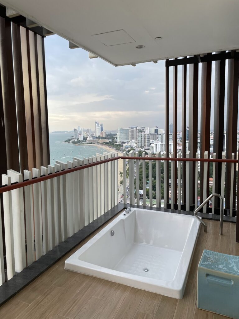 Balcony bathtub with Pattaya bay view at Hilton