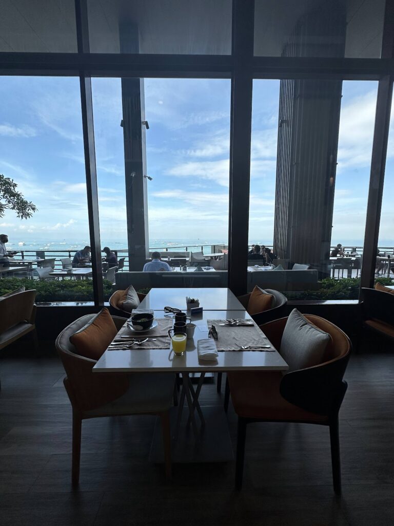 Breakfast table with sea views at Hilton Pattaya restaurant