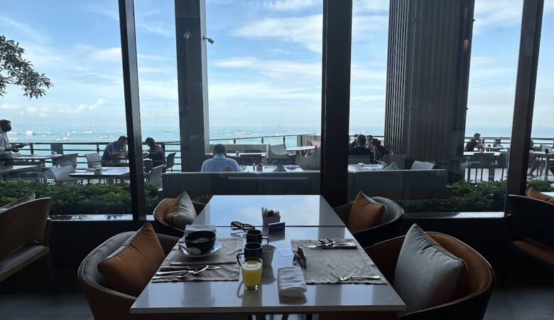 Breakfast table with sea views at Hilton Pattaya restaurant