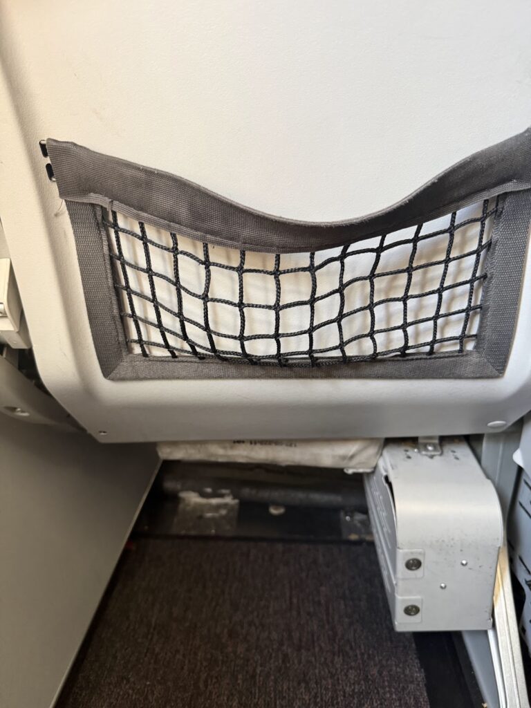 Seat-back storage net in LATAM A321 Premium Economy
