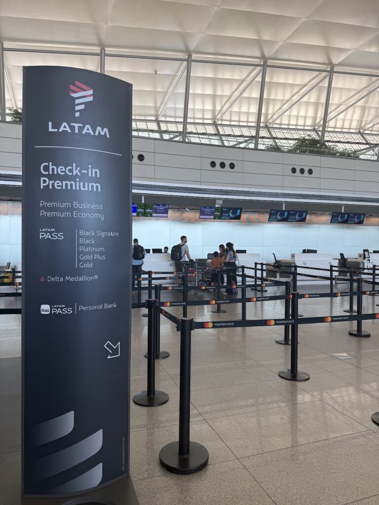 LATAM premium check-in sign at Montevideo Airport