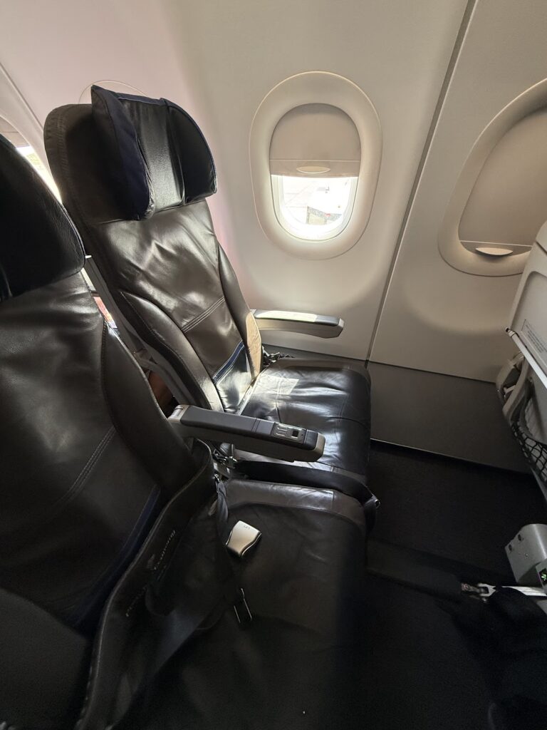 Black leather recliner seats in LATAM A321 Premium Economy
