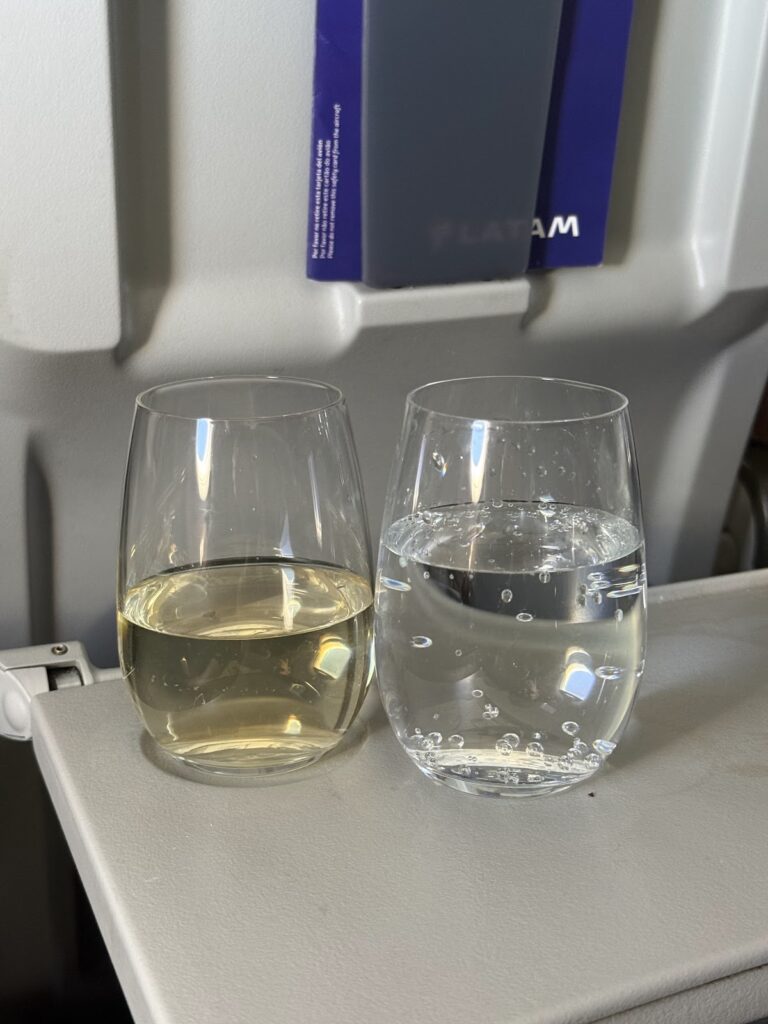 White wine and sparkling water in LATAM Premium Economy