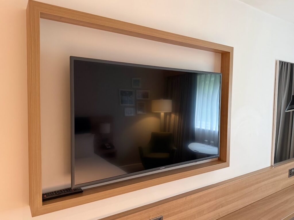 Wall-mounted TV in Hilton Garden Inn Abingdon guest room