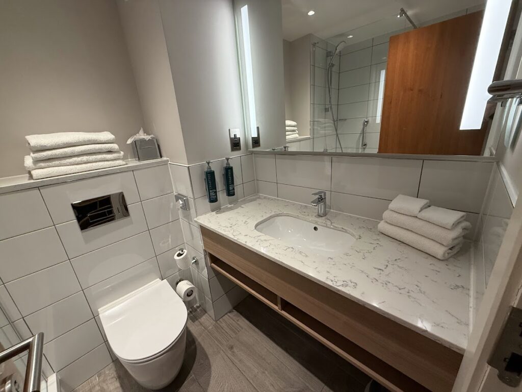 Bathroom with vanity and shower at Hilton Garden Inn Abingdon