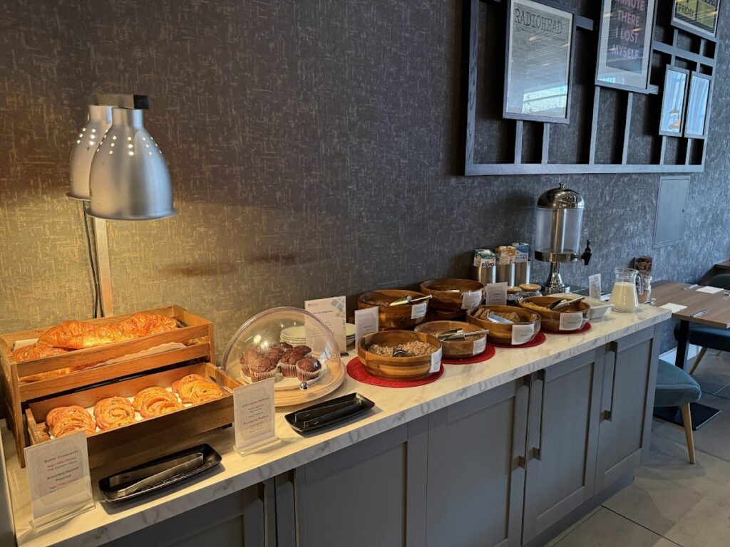 Continental breakfast buffet with pastries and cereals