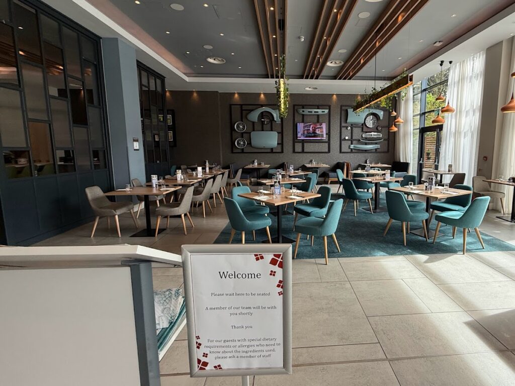 Hilton Garden Inn Abingdon restaurant with teal chairs