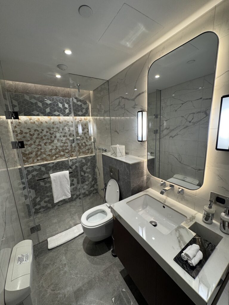 Marble shower room in Etihad First Class Lounge