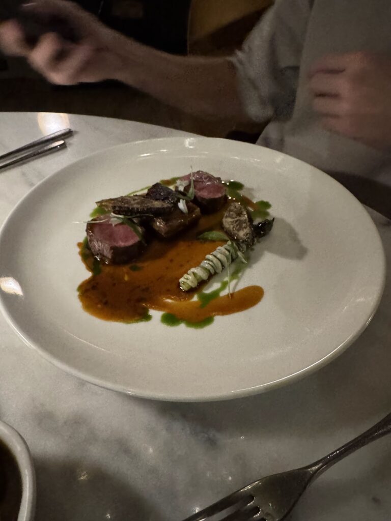 Seared meat main course at The Feathers restaurant