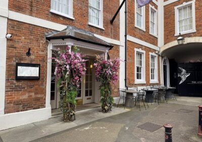 The Feathers Hotel Woodstock entrance with floral displays