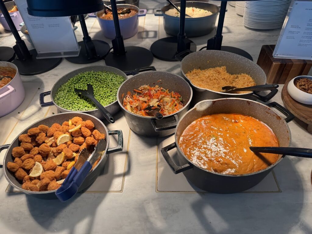 Hot food buffet with curry and sides