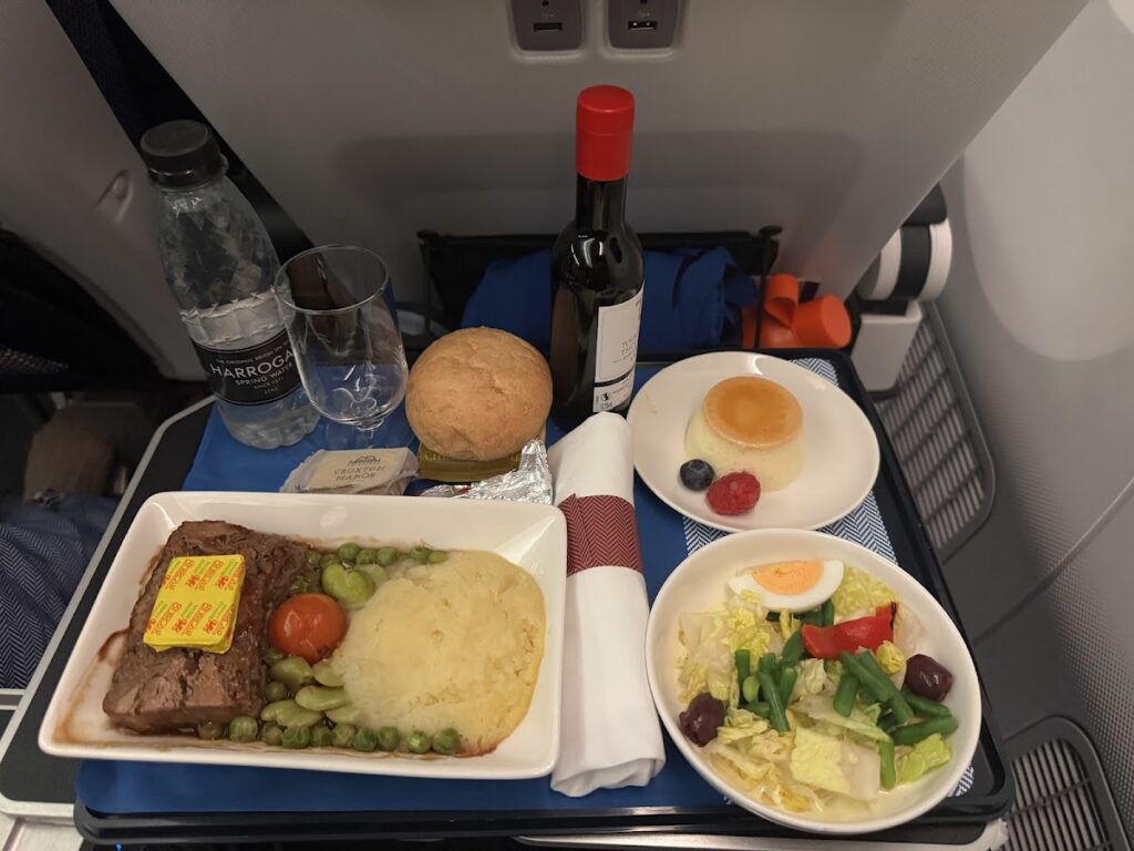 BA premium economy review meal with wine and dessert