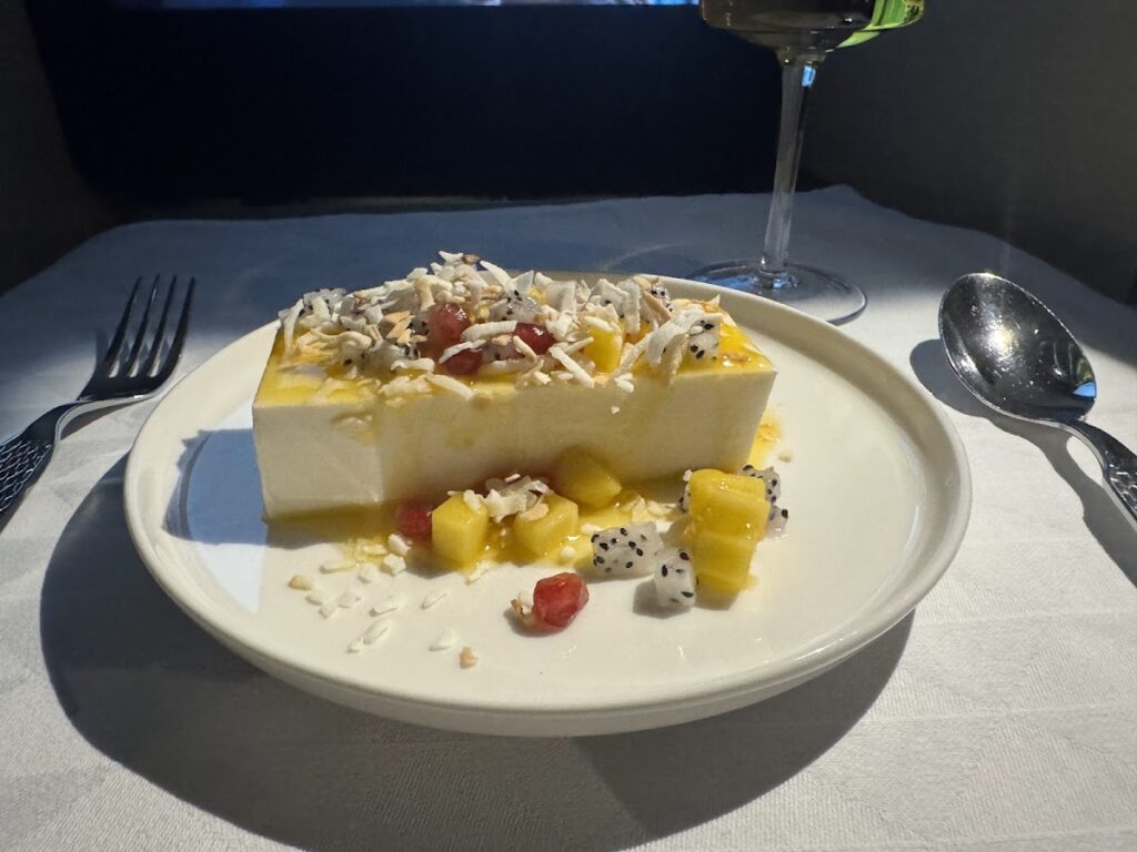 Tropical dessert with coconut on Etihad Business Class flight