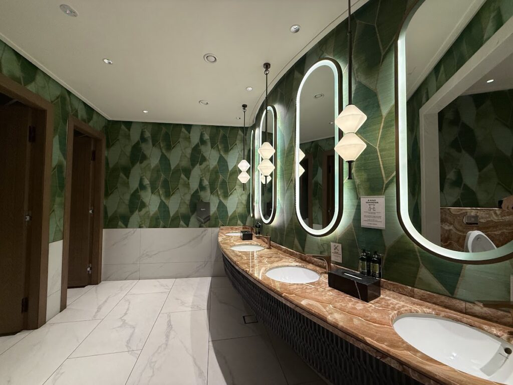 Washroom with marble counters at Global Lounge Kuala Lumpur Airport