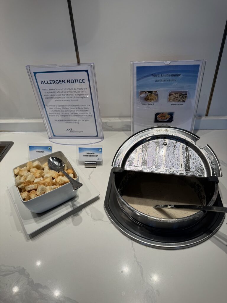 Mushroom soup and croutons on the buffet counter