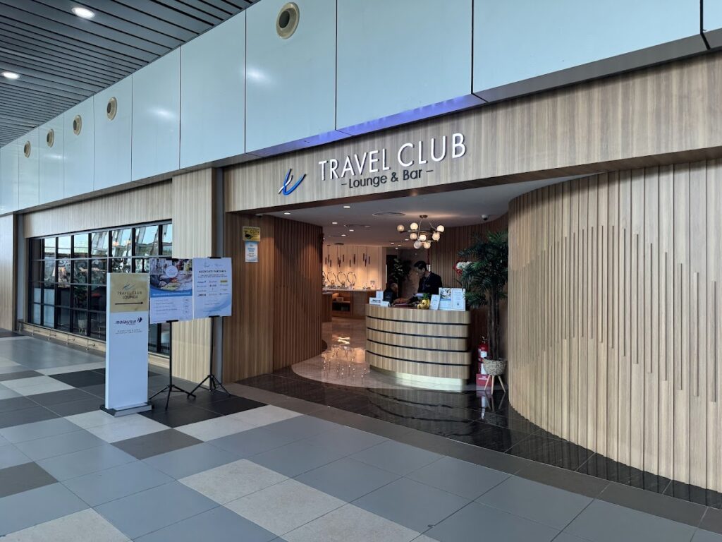 Travel Club Kota Kinabalu lounge entrance and reception desk