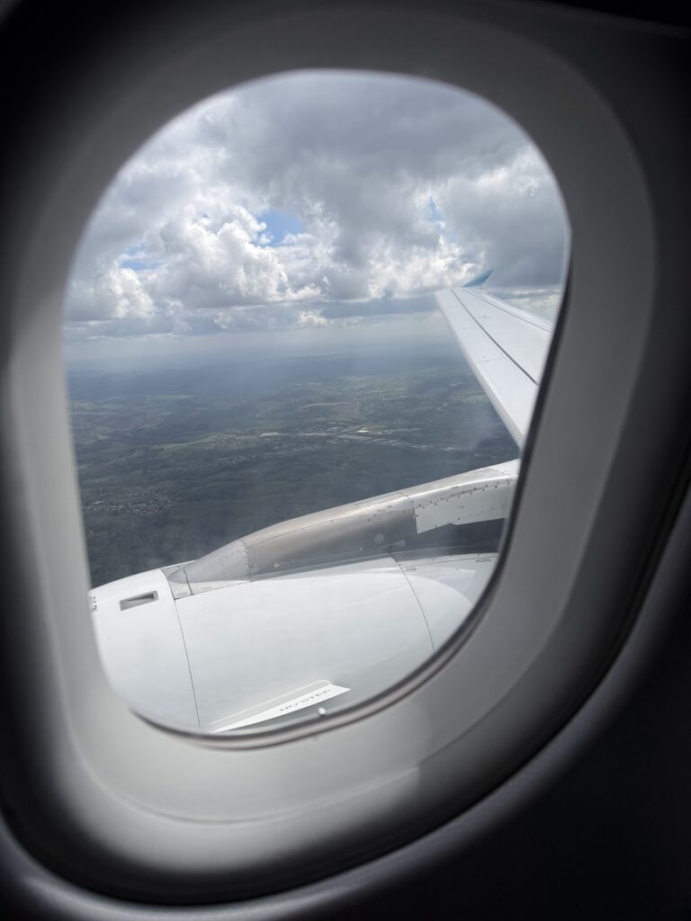 Wing view through Eurowings A319 window during flight