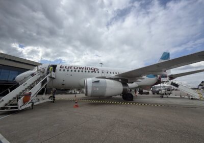 Eurowings A319 on the apron with boarding stairs