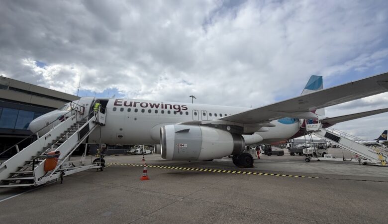 Eurowings A319 on the apron with boarding stairs