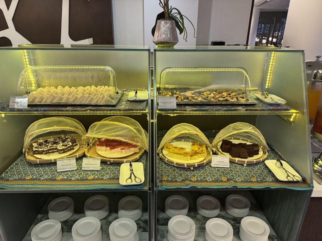 Cakes and pastries display at the Golden Lounge buffet