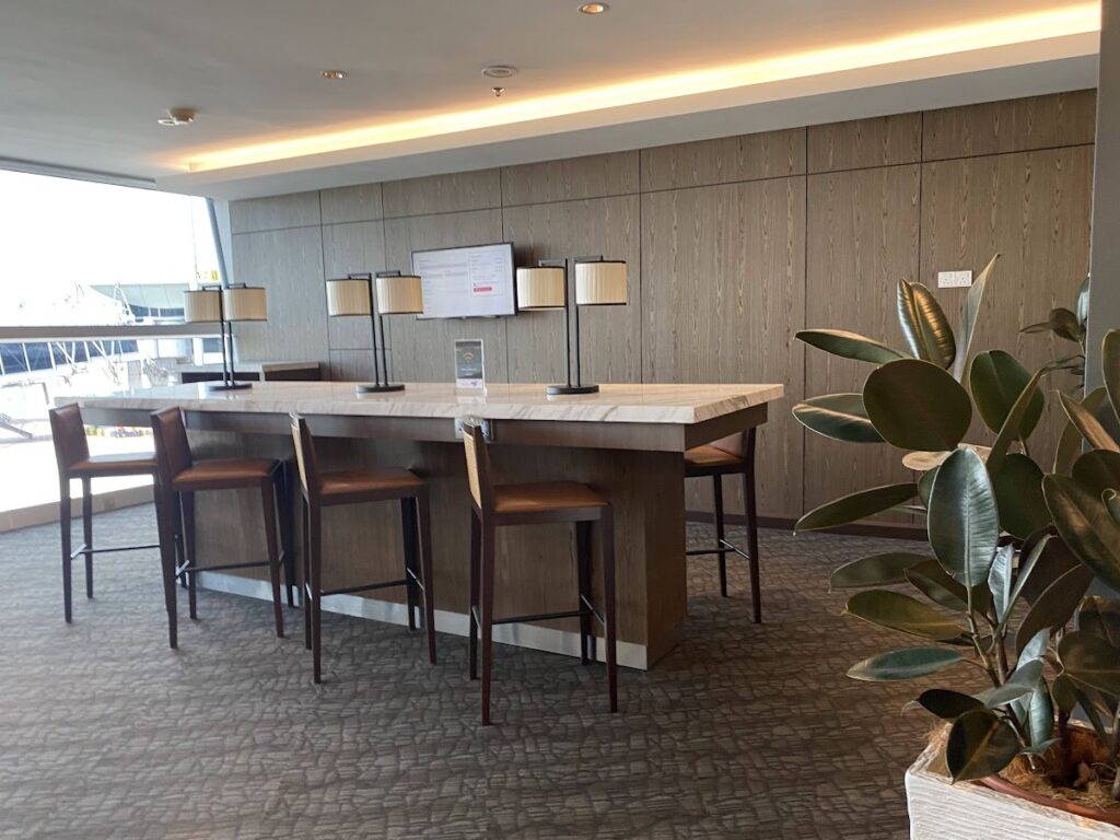 High-top work desk with lamps in the lounge