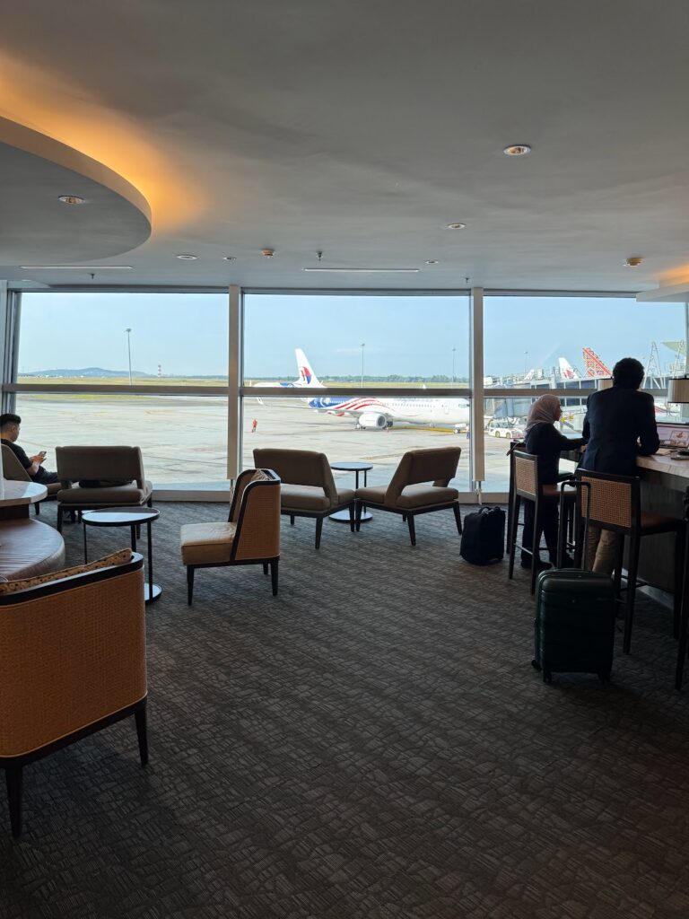 Malaysia Airlines Golden Lounge Domestic seating with tarmac views