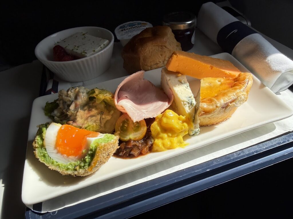 Club Europe meal tray with quiche and salad