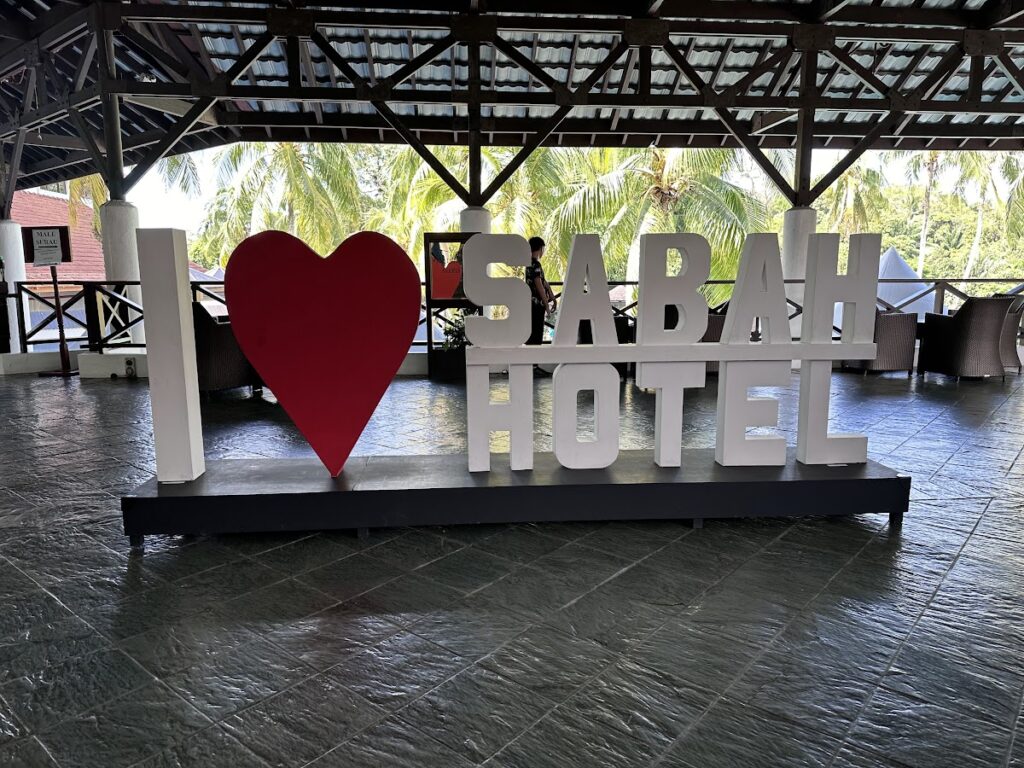 I love Sabah Hotel sign in open lobby