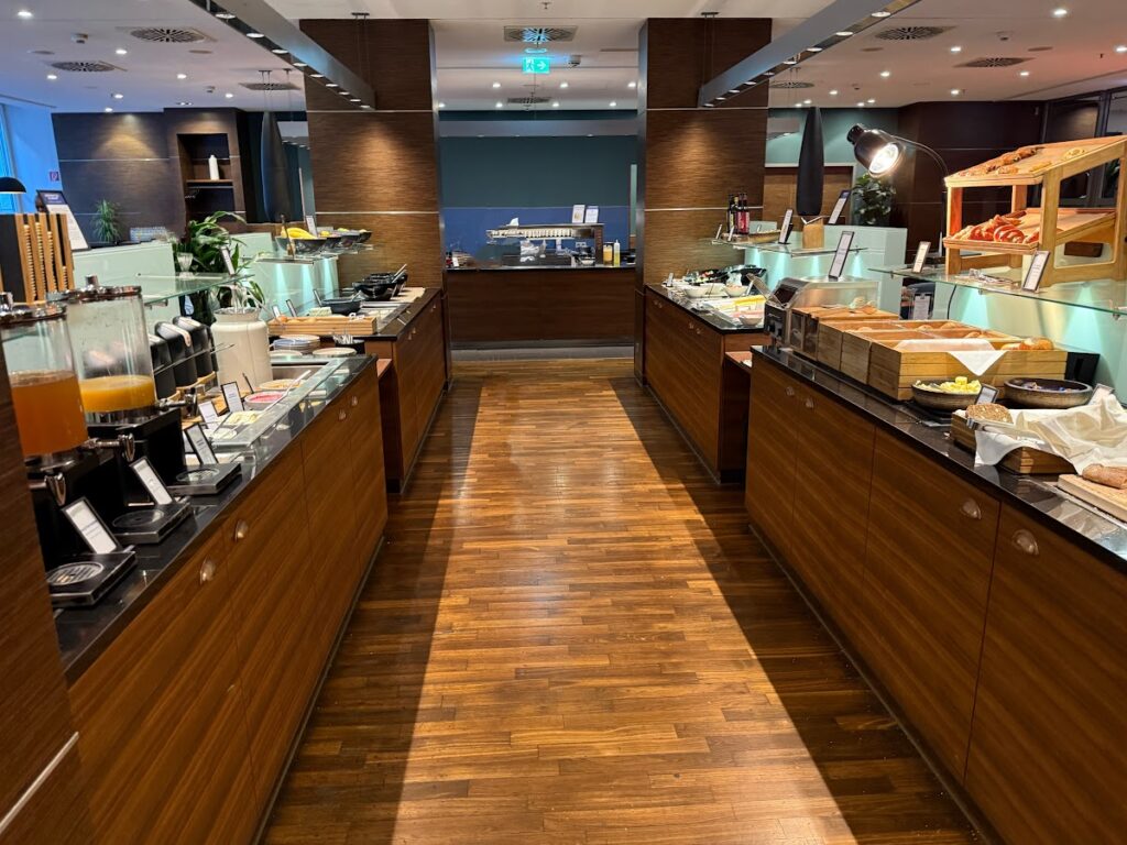Hilton Cologne breakfast buffet with drinks and pastries